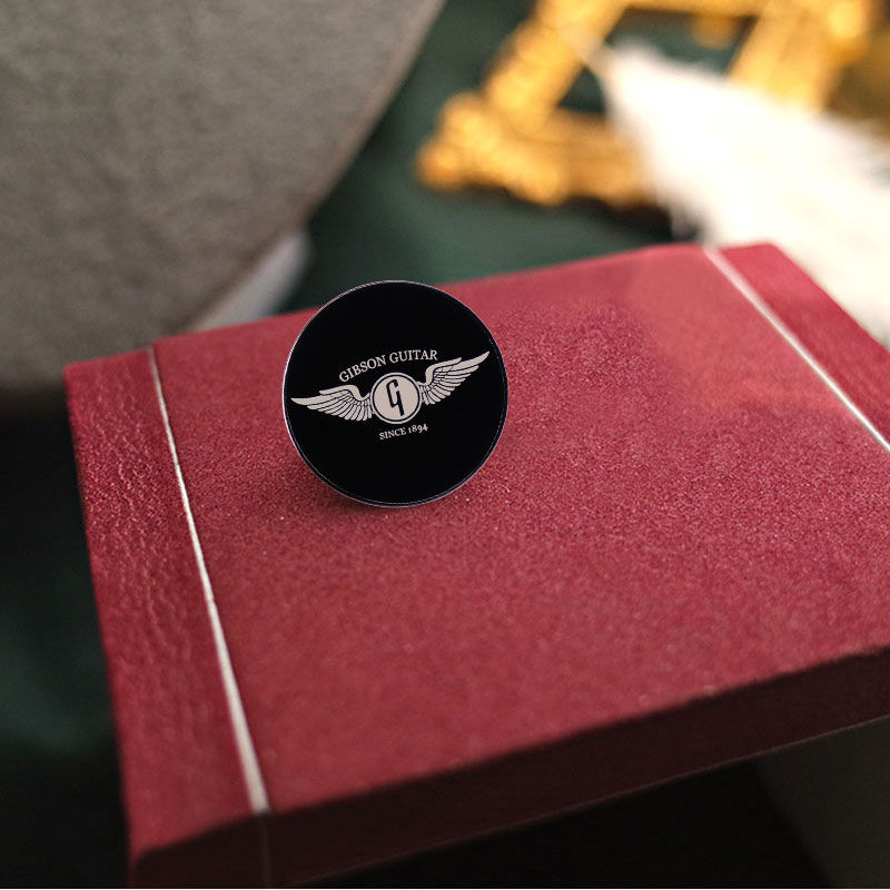 Gibson Gitarre Flügel Emaille  – Musical Instrument Logo Bewertung und Preis